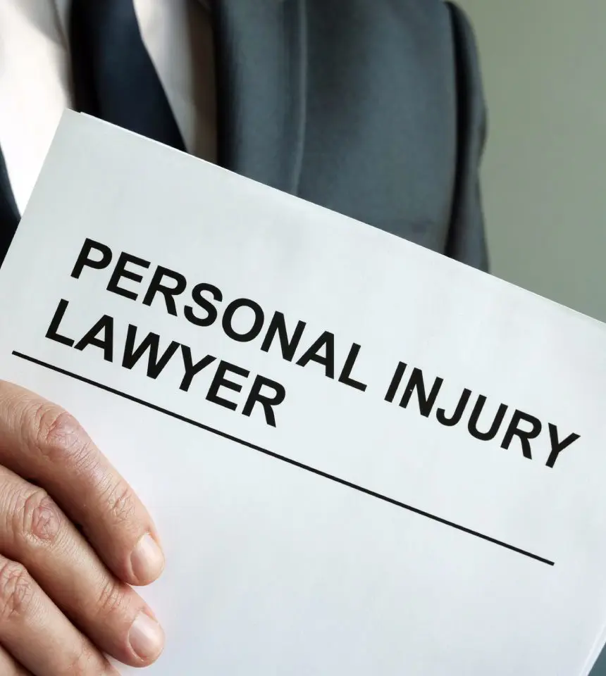 Here's an alt tag for the image: Personal injury lawyer document.