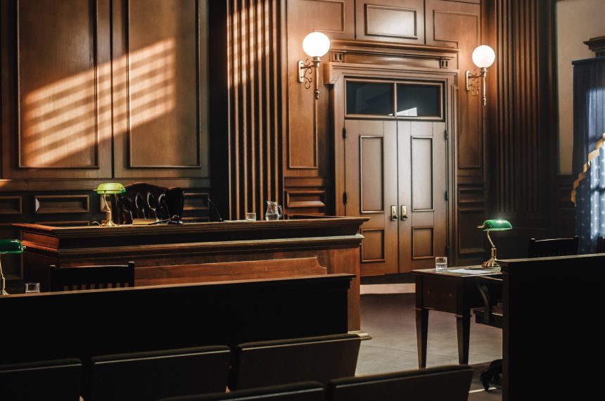 New Project (30) Here's an alt tag for the image: Judge's chambers, wooden courtroom.